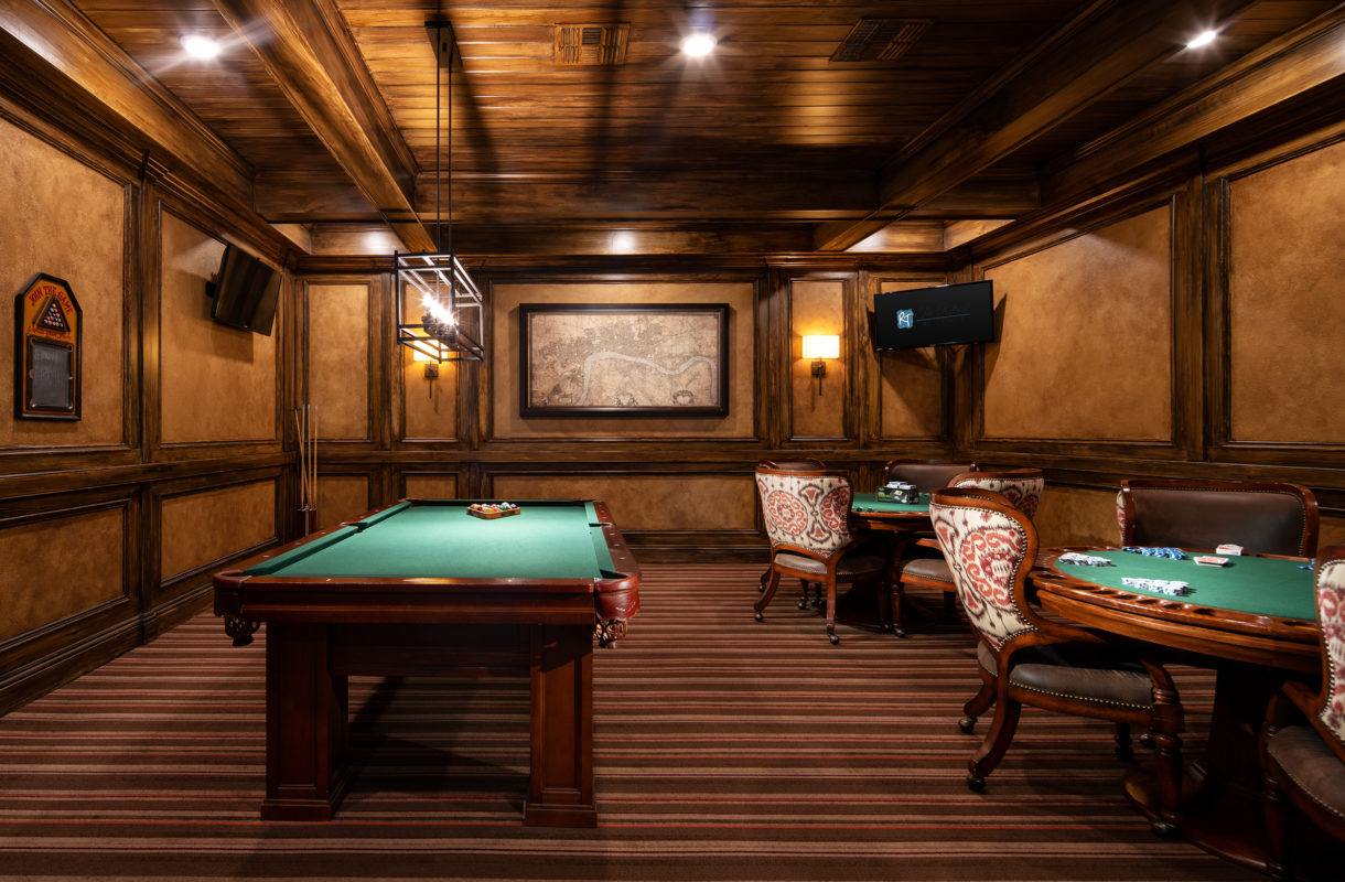 Poker room with television and billiards